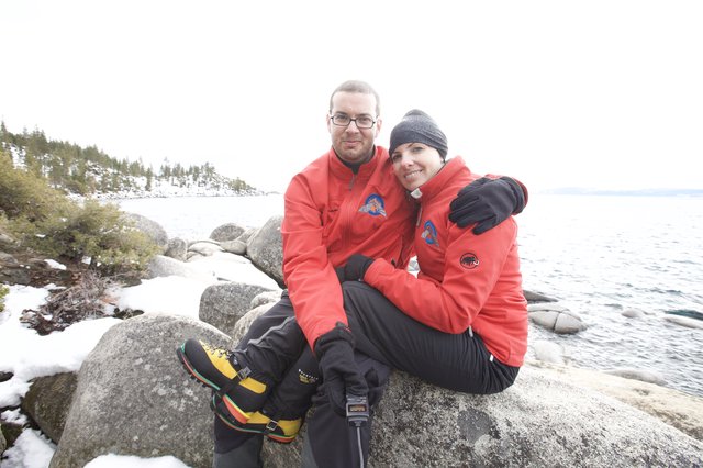 Couple Embracing on Snowy Lake Tahoe Shoreline