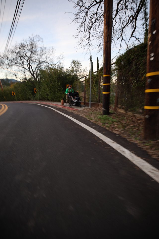 Early Morning Jogger on Winding Mountain Road