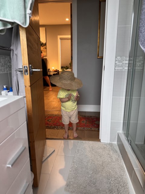 A Little Explorer in a Big Hat