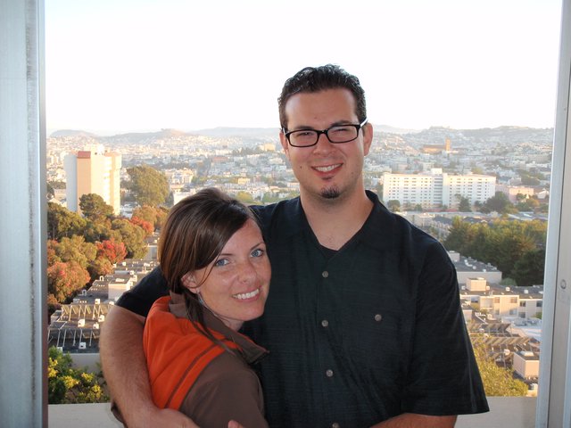 Couple Embracing with San Francisco Cityscape Behind