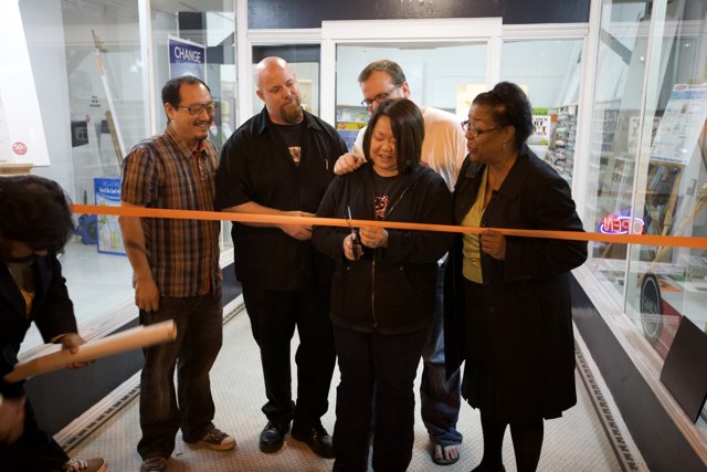 Ribbon cutting ceremony at new clothing store
