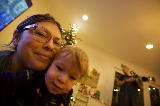Christmas Eve Selfie: Parent and Child Share a Cozy Moment