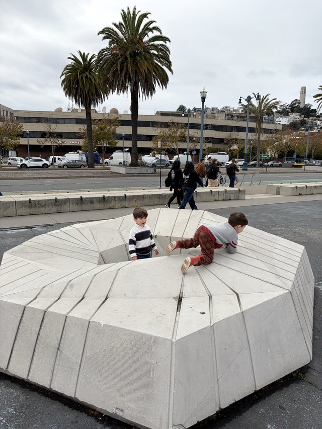 Children Playing on Modern Urban Amphitheater Structure