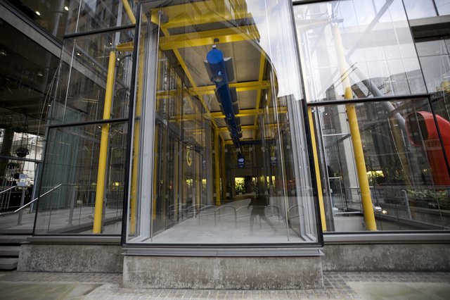 Transparent Glass Elevator Shaft in Modern London Building
