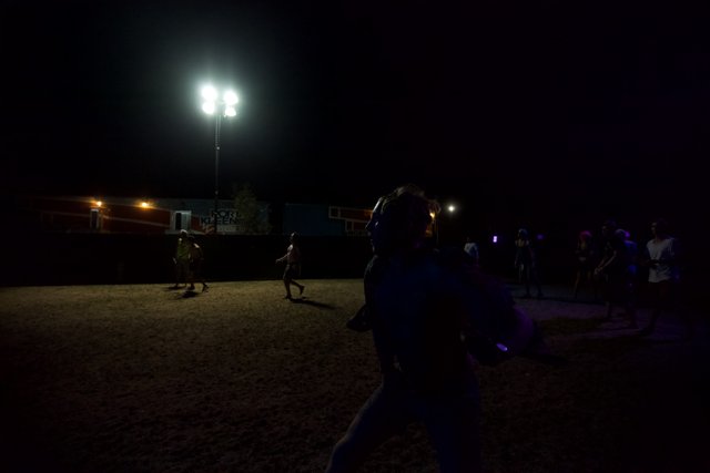 Night soccer game under the stars