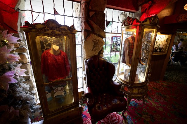 Vintage Christmas Display with Ornate Curio Cabinets