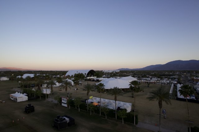 Coachella Music Festival: Tents, People, and Palm Trees