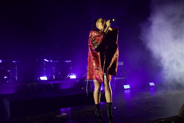 Bad Gyal Rocks the Stage in Red Dress