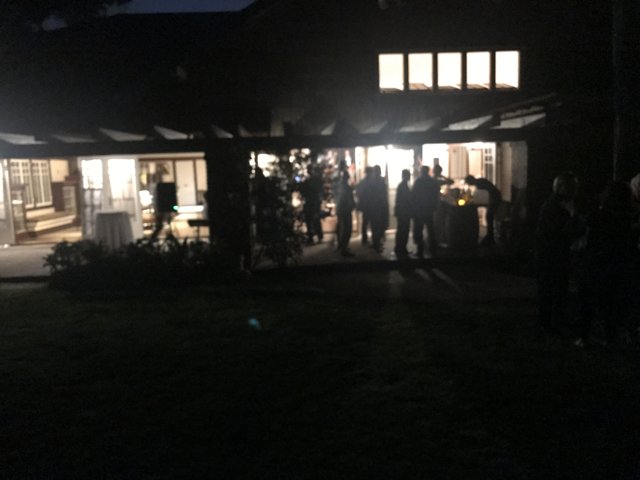 Nighttime Gathering in Front of Los Angeles Home
