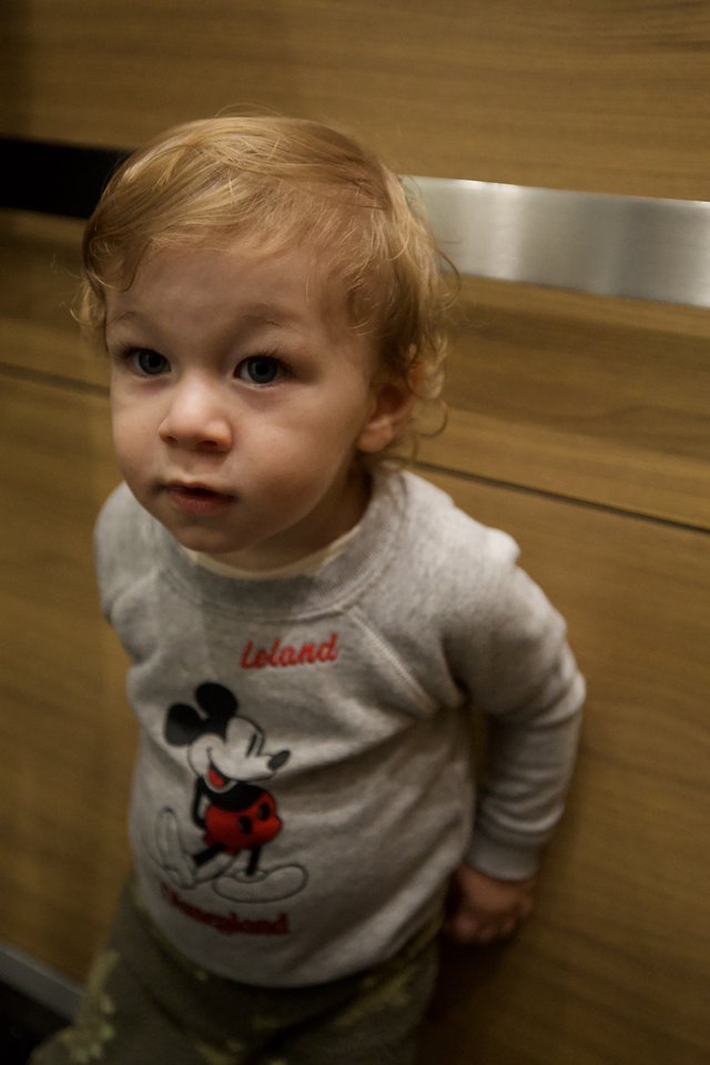 Toddler in Mickey Mouse Sweater at Home