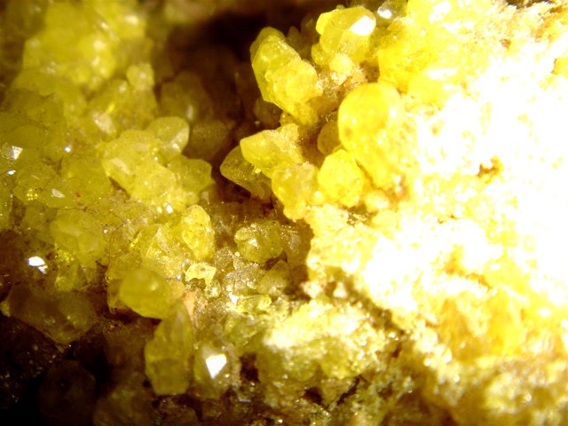 Yellow Quartz Crystals on Rock
