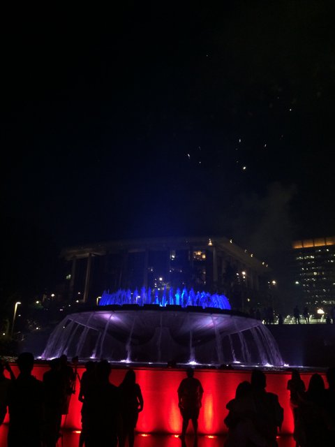 Nighttime Gathering at the Civic Center Fountain