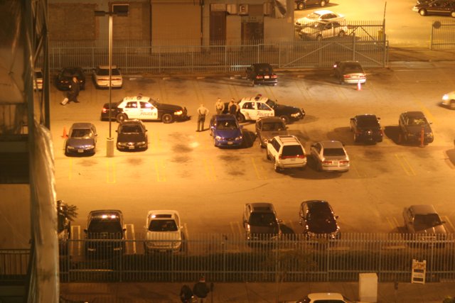 Police Presence in a Crowded Parking Lot
