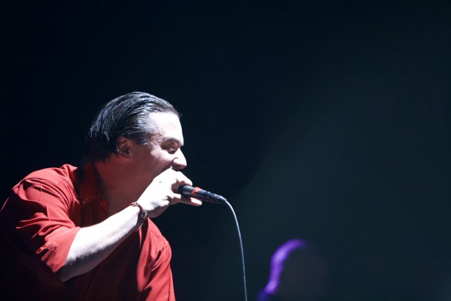 Red Shirted Singer Rocks the Mic at Coachella