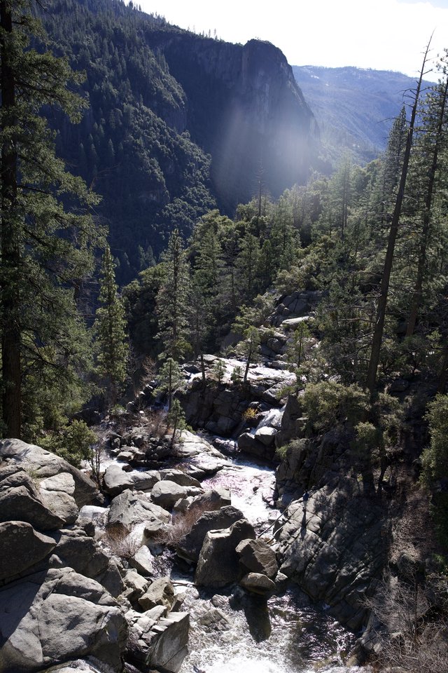 Mountain Stream Cascading Through Rocky Granite Canyon
