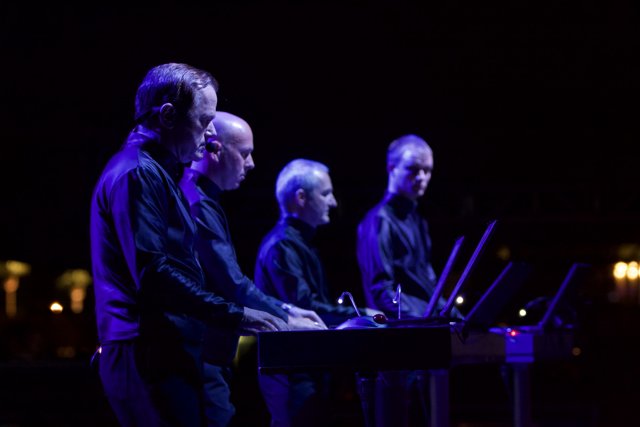 Four Men Entertain the Crowd with Their Keyboards