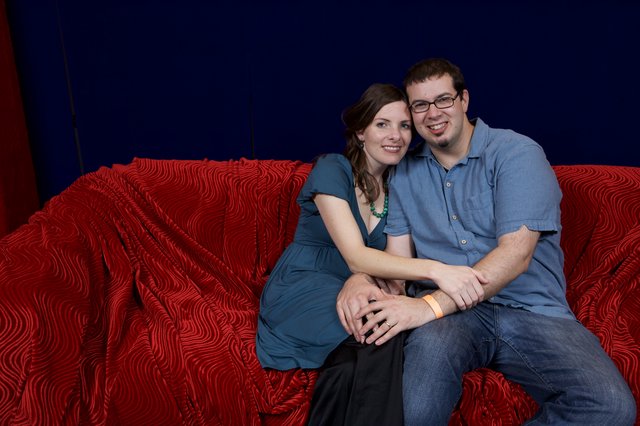 Couple Poses Together at Holiday Party Portrait