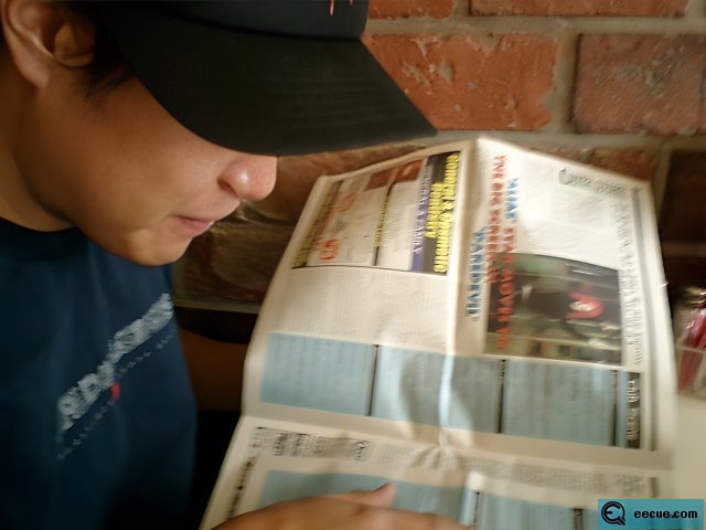 The Hat and the Newspaper
