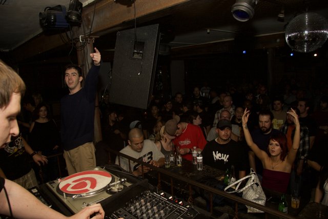 Grooving to the Beats: A DJ's Nightclub Performance