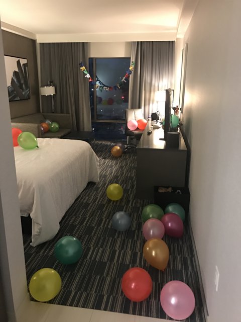 Balloon-Filled Hotel Room