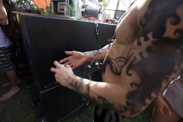 Tattooed Man Plays Video Games