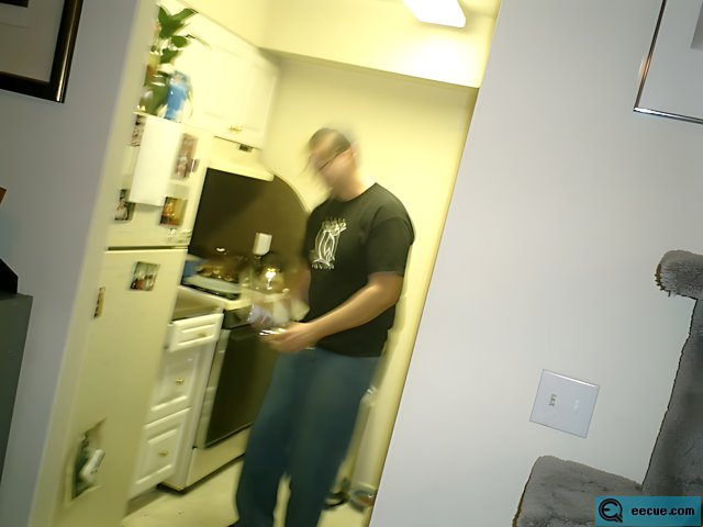 Blurry Portrait of a Man in his Kitchen