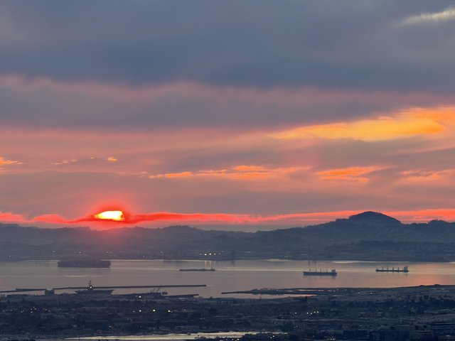 Sunset Over San Francisco Bay with Cargo Ships