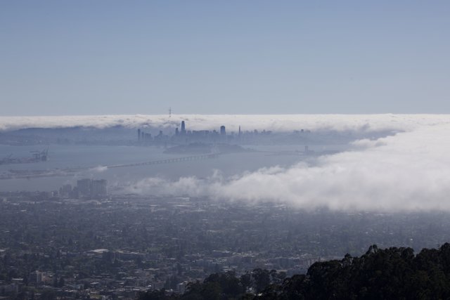 City Under the Clouds: A Spectacular Foggy Day View