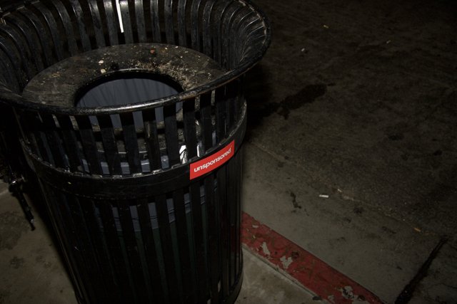 Red-Labeled Tin Trash Can