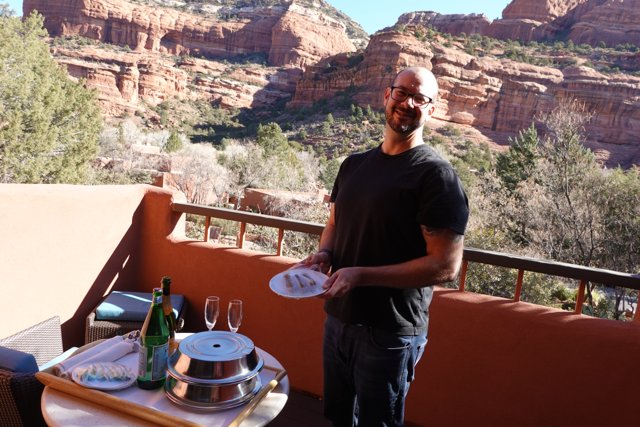 Man Enjoying a Scenic Outdoor Meal