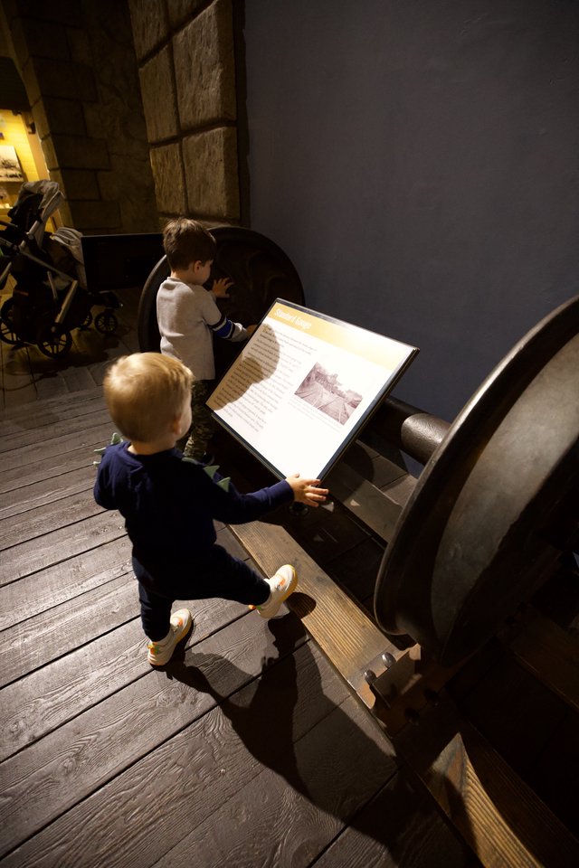 Young Explorers at Interactive Museum Cannon Exhibit