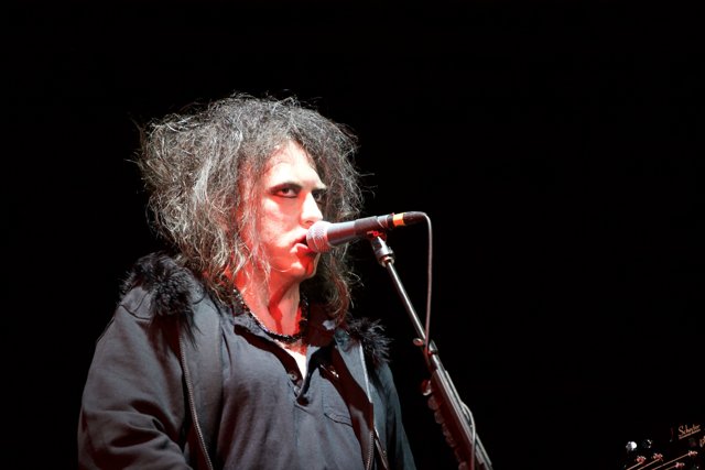 Robert Smith performs with the Cure at the O2 Arena