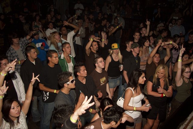Urban Nightclub Crowd Goes Wild at Concert