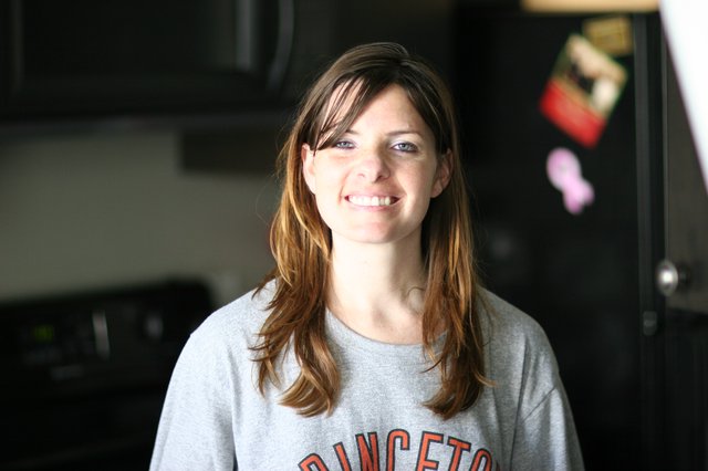 Smiling Woman in Princeton Sweatshirt at Home