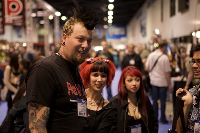 Tattooed Man and Two Women Posed for a Portrait