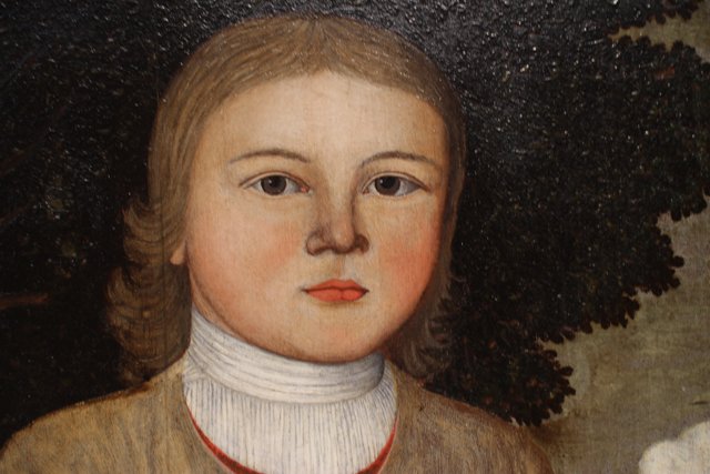 Portrait of a Young Boy with a White Collar