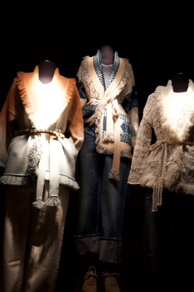 Luxurious Fur-Trimmed Winter Fashion Display on Mannequins