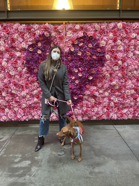 Masked Woman and her Flowered Furry Friend