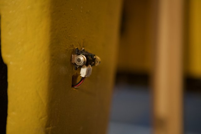 Tiny Electrical Device on Wall