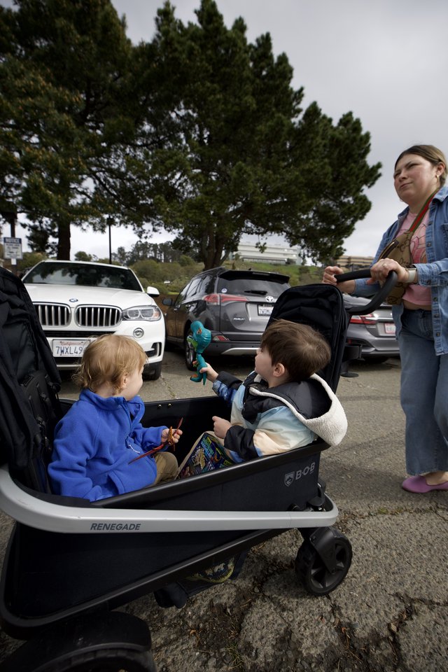 Family Outing with Kids in Wagon at Parking Lot
