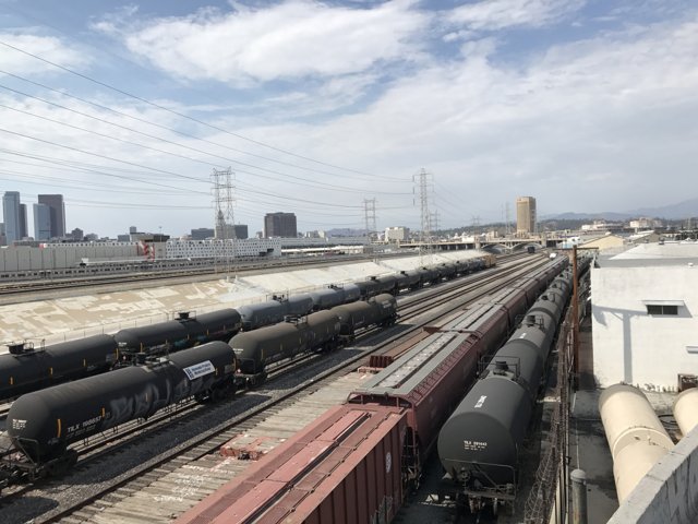 Busy Train Yard in the City