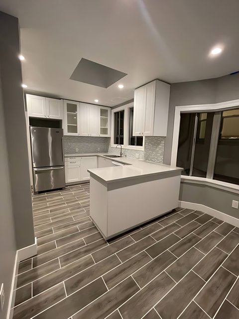 Modern White Kitchen with Tile Flooring