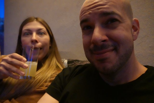 Couple Enjoying Drinks Together at Restaurant