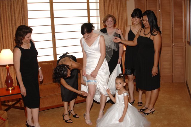 Bride Getting Garter Placed Before Wedding Ceremony