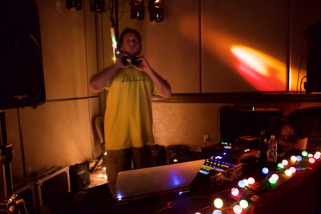 Yellow-shirted DJ in the Spotlight