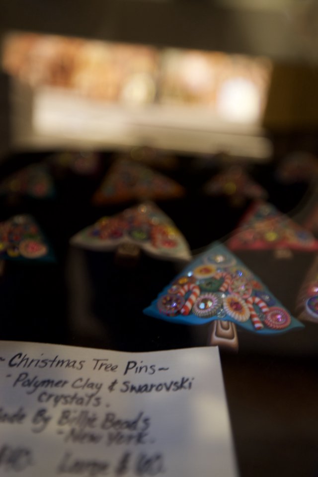 Handcrafted Christmas Tree Pins with Swarovski Crystals Display