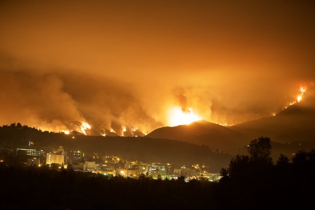 Blazing Hills and Cityscape Fire