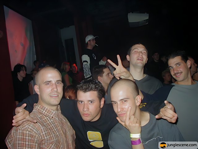 Group of Men Having Fun at a Nightclub Party