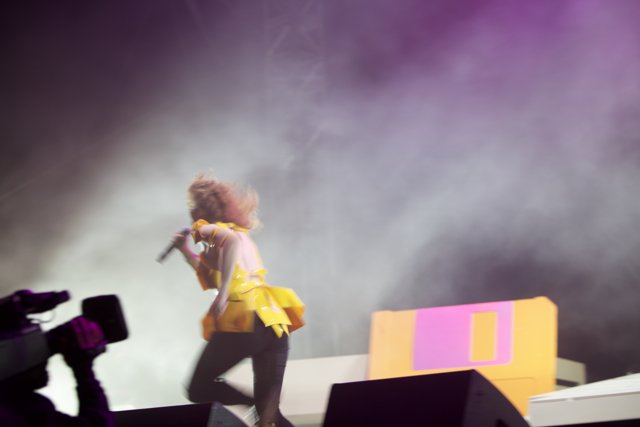 Yellow-Dressed Woman Lights Up Coachella Stage