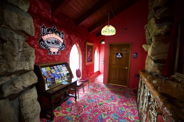 Ornate Madonna Inn Lobby with Bold Red Victorian Decor